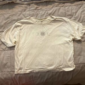 White tank top with sin and moon.